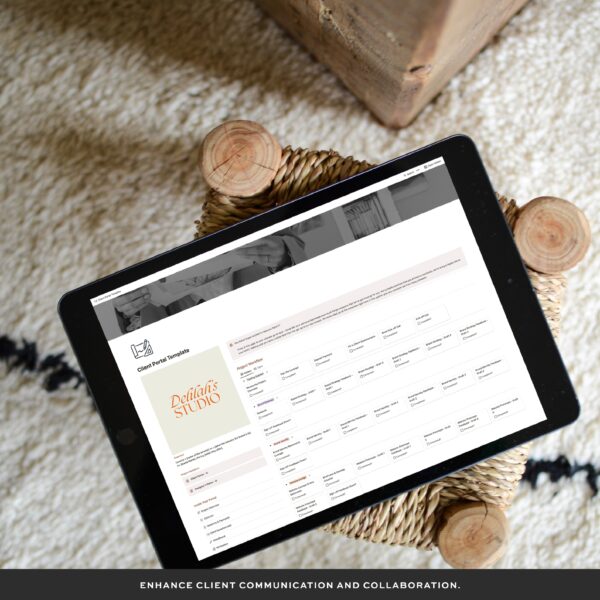 Tablet displaying the Client Portal Template page of the Ultimate Notion Client Portal Template, placed on a woven mat. Text reads: 'Enhance client communication and collaboration.'
