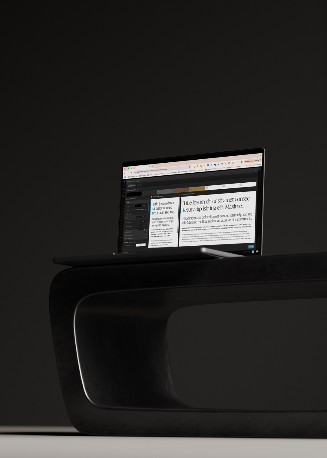 Showit's design editor displayed on a sleek laptop, showcasing custom font settings and typography options in a minimalist, dark workspace.